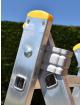 Steel pivot mechanism converts ladder easily to 2 sided step ladder and extension ladder